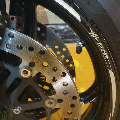 Close-up of a motorcycle wheel with MV Agusta branding