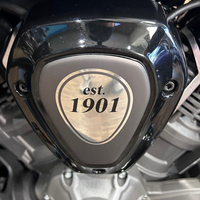Motorcycle headlight with 'est. 1901' branding