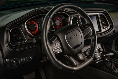 Dodge Steering wheel with logo in a car interior