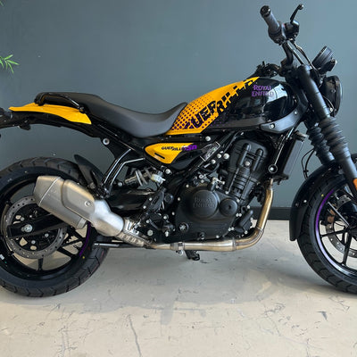Motorcycle with yellow and black design on a gray background