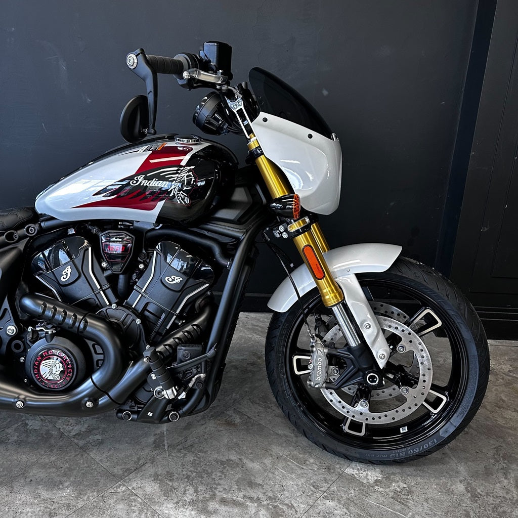 Motorcycle with a white and black design on a dark background