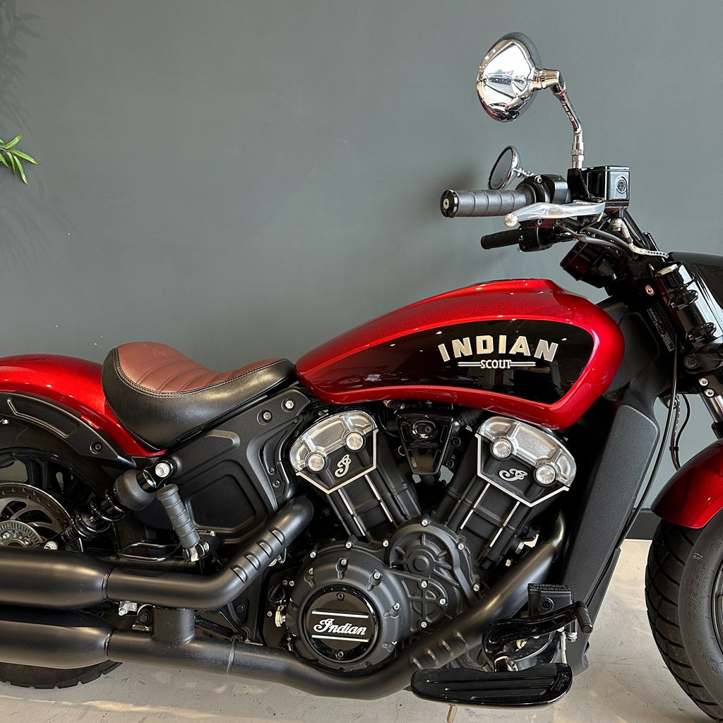 Red Indian motorcycle with a gray background