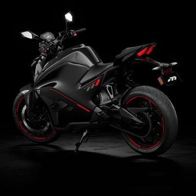 Black motorcycle with red accents on a dark background