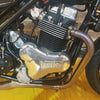 Close-up of a motorcycle engine with 'Vorone' branding on a textured surface.