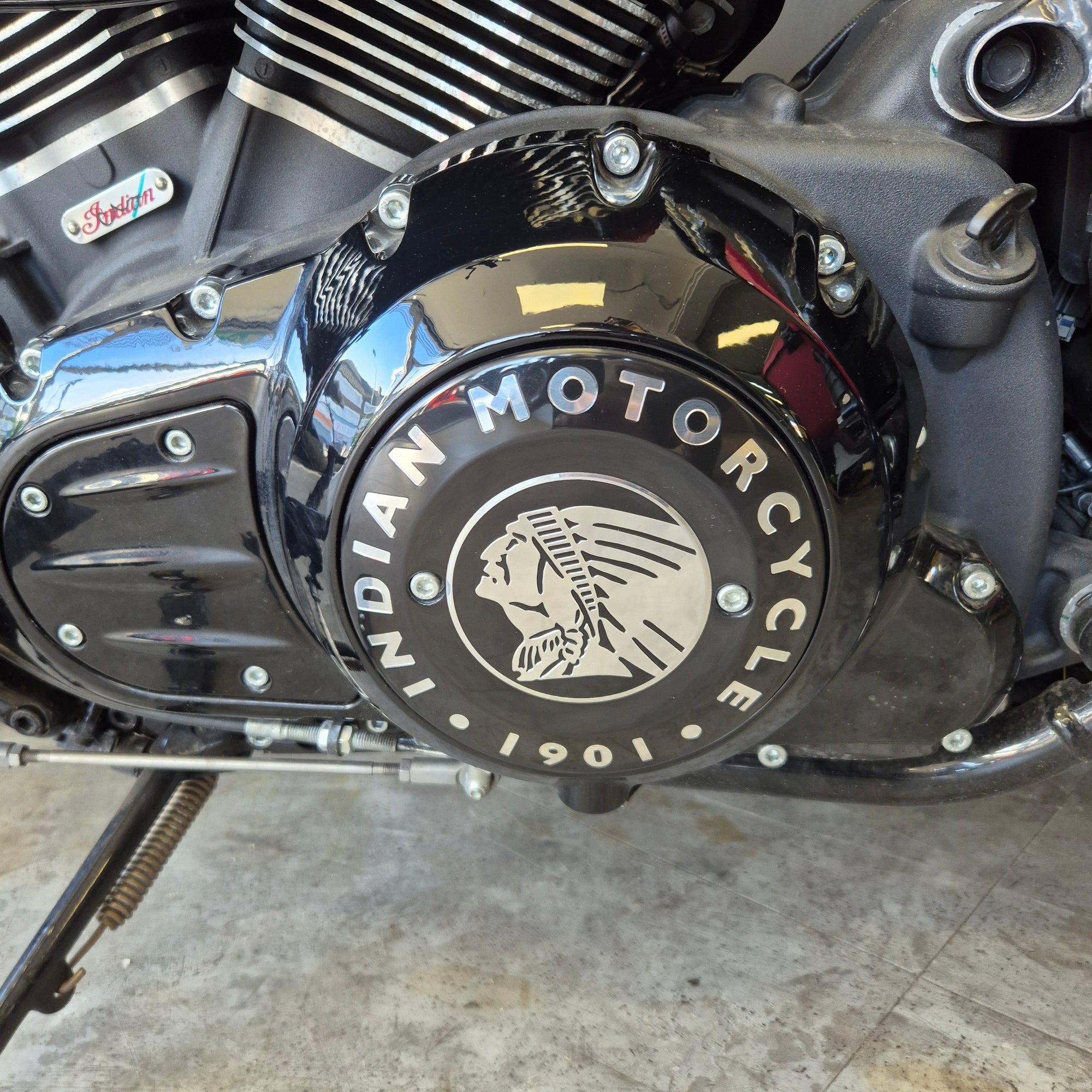 Close-up of a motorcycle engine with 'Indian Motorcycle' logo.