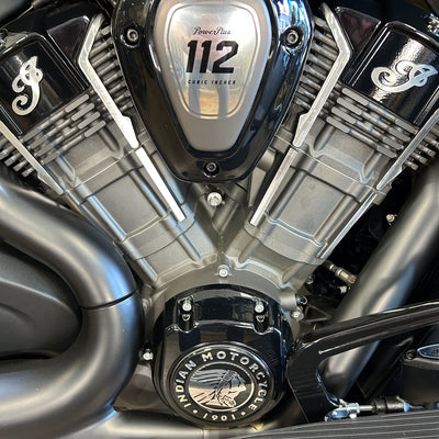 Close-up of a motorcycle engine with 'Indian Motorcycle' branding.