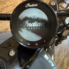 Close-up of a motorcycle handlebar with an 'Indian Motorcycle' display.