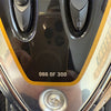 Close-up of a golf club head with '066 OF 300' text on a reflective surface.