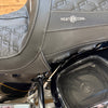 Motorcycle seat with 'Heat Cool' branding and a speaker grille.