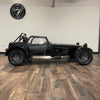 12/12 CATERHAM SEVEN ROADSPORT 150 LARGE CHASSIS - GRAVITY BLACK WITH BLACK LEATHER