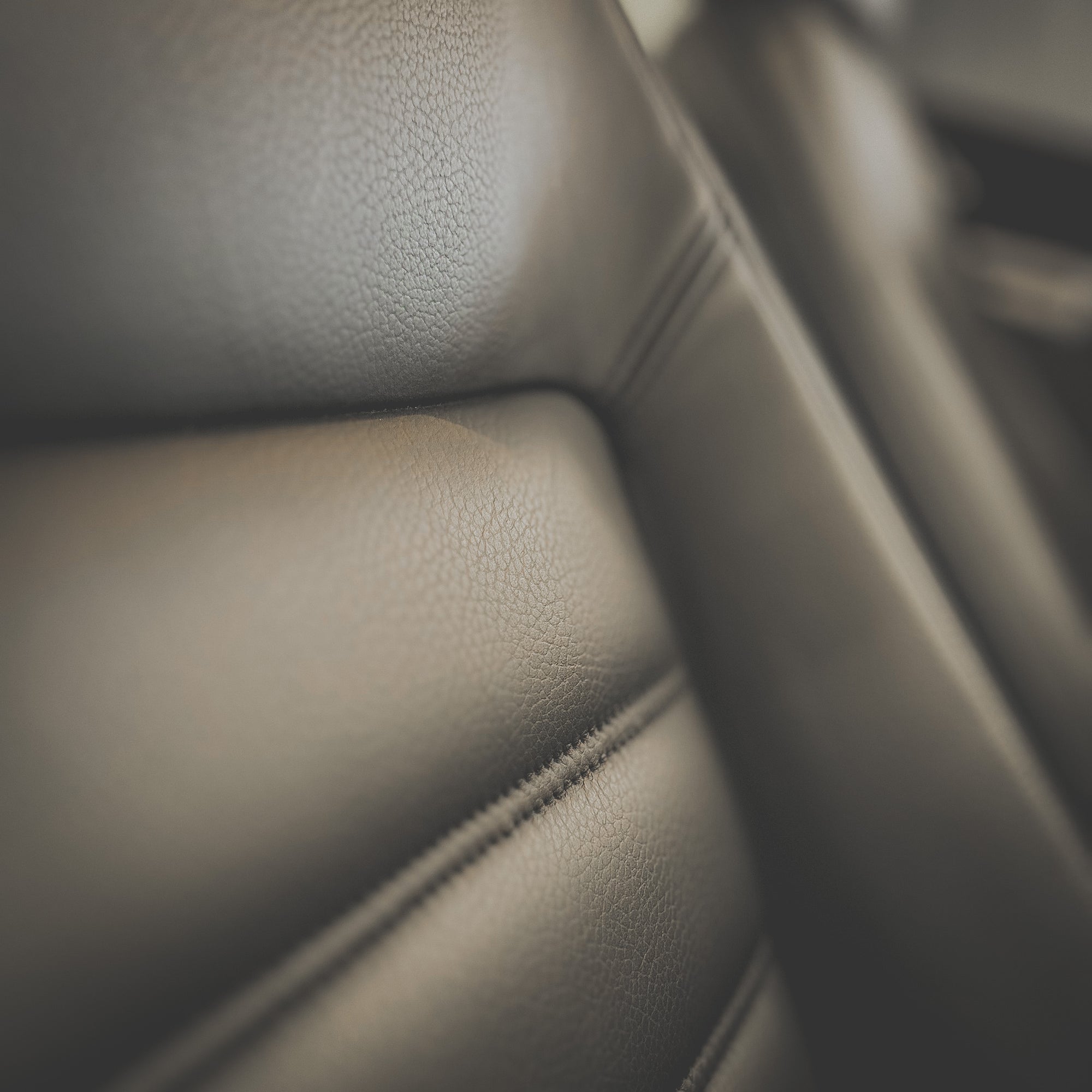 Close-up of a car's brown leather interior