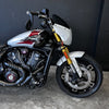 Motorcycle with a white and black design on a dark background